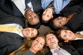 pic of business people  - business people teamwork in an office with heads together - JPG 