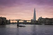 pic of sunset  - the shard skyscraper part of the central london skyline along the banks of the thames at sunset - JPG 