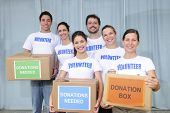 picture of food  - diverse volunteer group with food donation boxes - JPG 