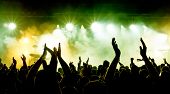 pic of stage  - silhouettes of concert crowd in front of bright stage lights - JPG 
