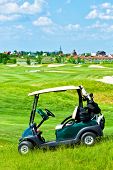 stock photo of golf  - green Golf club car at golf field - JPG 