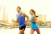 picture of fitness  - City running couple jogging outside - JPG 