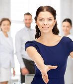 picture of handshake  - lovely woman with an open hand ready for handshake - JPG 