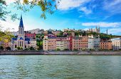 stock photo of france  - Lyon cityscape from Saone river with colorful houses and river France - JPG 