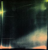 stock photo of leak  - Designed medium format film background with heavy grain dust and light leak - JPG 
