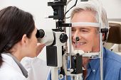pic of medical doctors  - Optometrist performing visual field test - JPG 