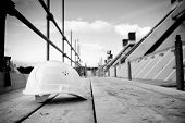 pic of buildings  - empty building site with left helmet on scaffold - JPG 
