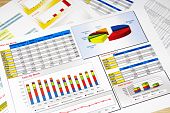 stock photo of report  - Sales Report in Statistics Graphs and Charts Colored
 - JPG 