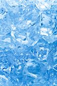 stock photo of ice  - background with ice cubes in blue light - JPG 