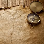 image of longitude  - Close up view of the compass on old paper - JPG 