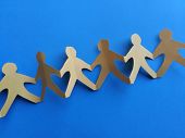 Paper people chain on blue background