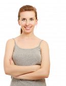 pic of close-up  - Young woman standing with folded arms isolated on white backgroind - JPG 