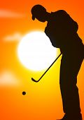 stock photo of golf  - Young male playing golf in the evening - JPG 