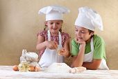 picture of hat  - Kids with chef hats preparing the cake dough  - JPG 
