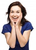 stock photo of woman  - Young woman is holding her face in astonishment - JPG 