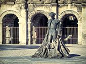picture of france  - Roman Coliseum with a statue of a bullfighter - JPG 