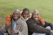 stock photo of outdoor  - African American family smiling outdoors - JPG 