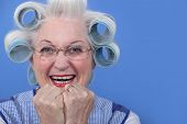 foto of laughing  - senior woman with curlers in her hair laughing - JPG 