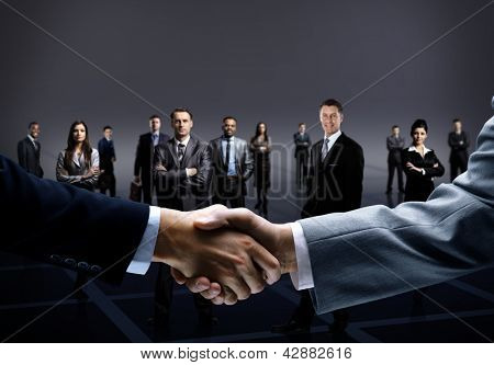 Picture or Photo of Handshake isolated on business background