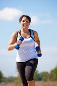 image of outdoor  - Plus Size Female Exercise Outdoor Happy Smile Under Sunny Blue Sky - JPG 