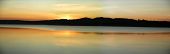 picture of reflexion  - Evening atmosphere over a lake - JPG 