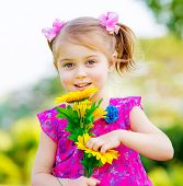 picture of nature  - Happy baby girl playing outdoor - JPG 