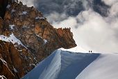picture of team  - Team of two alpinists climbing a mountain - JPG 
