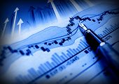 picture of investment  - business image of pen indicate grow on financial diagram - JPG 