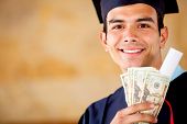 pic of money  - Male graduated holding money  - JPG 