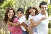 pic of family  - Portrait of Happy Family In Park - JPG 