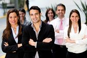 picture of group  - Successful business group looking confident and smiling - JPG 