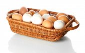 picture of many  - Many eggs in basket isolated on white - JPG 