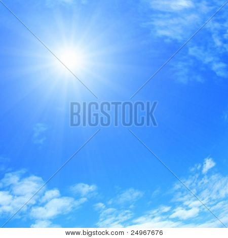 Picture or Photo of Sun and blue sky with clouds.
