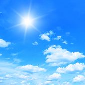 stock photo of blue  - Sun in bright blue sky - JPG 