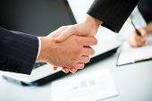 image of business people  - Business people joining hands together for deal - JPG 