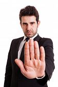 stock photo of businessmen  - Businessman in suit showing STOP - JPG 
